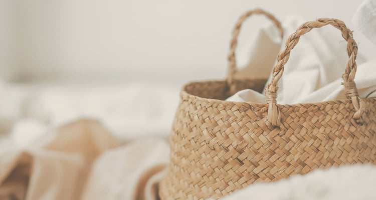 Woven basket with linens